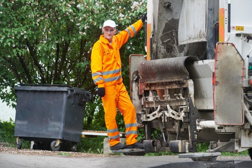 Inspector documenting a commercial waste audit